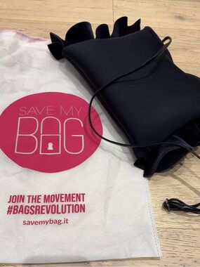 Save My Bag Ruffled Crossbody or shoulder or clutch bag made out of neoprene.